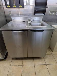 lot 29 image: DUKE STAINLESS STEEL CABINET W SINK