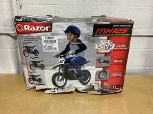 lot 56 image: Razor Dirt Rocket MX125 Electric-Powered Dirt Bike
