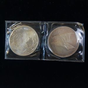 lot 21 image: 2 ONE OUNCE .999 SILVER BULLION - TAX EXEMPT  GOLDEN STATE MINT  EAGLE & INDIAN HEAD