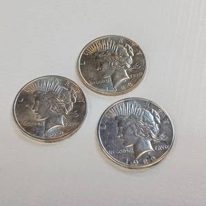 lot 52 image: 3 SILVER PEACE DOLLARS  2 FROM 1922 AND ONE 1923