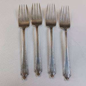 lot 71 image: COLLECTION OF 4 SOLID STERLING FORKS  100% STERLING SILVER (NOT STAINLESS)  127.25 GRAMS TOTAL WEIGHT