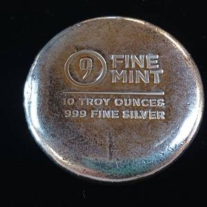 lot 80 image: VERY COOL TAX EXEMPT  .999% 10 OZ BULLION ROUND LOAF  FINE MINT #9