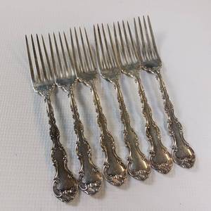 lot 91 image: 10 PIECE COLLECTION OF SOLID STERLING SILVER ORNATE FLATWARE  7 FORKS   TOTAL WEIGHT OF 281 GRAMS