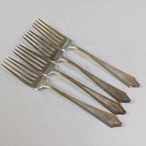 lot 92 image: 4 PIECE COLLECTION OF SOLID STERLING SILVER FORKS   TOTAL WEIGHT OF 162.7 GRAMS