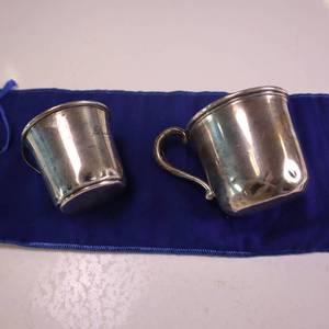 lot 9 image: 100% STERLING SILVER CUPS WITH SILVER HANDLES  2.5 X 3 inches & 2.5 X 2  inches   TOTAL WEIGHT IS 102 GRAMS