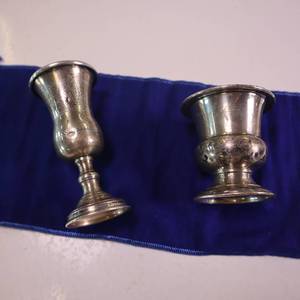 lot 8 image: 100% STERLING SILVER CHALICES  ORNATE DESIGN  TALLER ONE IS 4 X 2, THE OTHER IS 3 X 2.5  COMBINE WEIGHT OF BOTH IS GRAMS 80.5 GRAMS