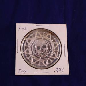 TAX EXEMPT :: .999% VERY UNIQUE 1 OZ BULLION COIN :: DATED 2009 :: SKULL IN  PYRAMID TIPPED OCTAGAN BACKED BY RAYS OF SUN
