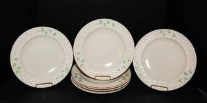lot 57 image: Set of 7 Irish Belleek Basketweave Shamrock Dinner Plates