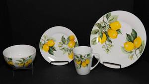 lot 105 image: Lemon Motif Place Setting for Four  Plates, Bowls & Mugs - Brand New  in Box