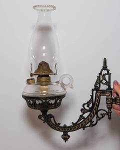 lot 117 image: Antique Oil Lamp with Cast Iron Wall Bracket