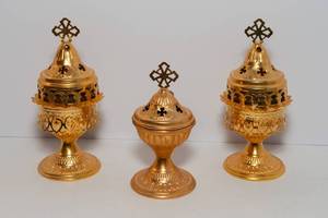 lot 149 image: Set of Three Religious-Inspired Candle HoldersIncense Burners