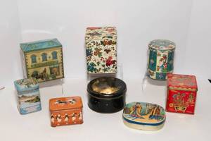 lot 229 image: Set of Eight Tins