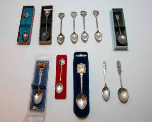 lot 321 image: Travel Souvenir Spoon Collection  Set of 12 (Sterling & 800 Silver Included)