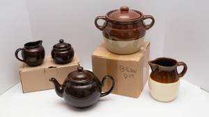 lot 377 image: Brown Ceramic Kitchenware Collection  Teapot, Creamer & Sugar, Bean Pot, and Pitcher