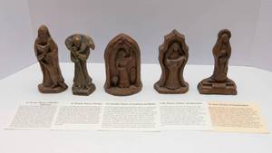 lot 387 image: Set of 5 Carved Resin Saints - St. Jerome, St. Cecelia, St. Dorothy, St. Anne, and St. Patrick