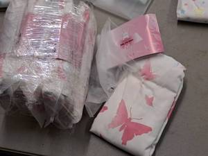 lot 27 image: Lot of (8) Houseware Homes Butterfly pattern Baby Crib Sheets