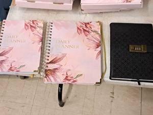 lot 182 image: (5) Daily Planners 6x8, (10) Daily Planners 7x9-12, (15) Black Diaries 6x8 with Box and Pen