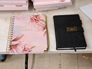 lot 189 image: (25) Daily Planners 7x9-12, (25) Black Diaries 6x8