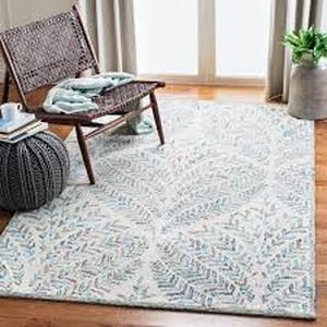 lot 38 image: SAFAVIEH Capri IvoryBlue Doormat 3 ft. x 5 ft. Geometric Leaf Area Rug Customer Returns See Pictures