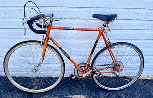 lot 82 image: Vintage Orange Sentinel Brand Bicycle