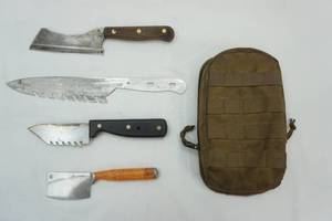 lot 15 image: Small Military Pack & 4 unique knives