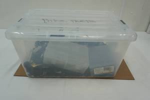 lot 25 image: 45qt plastic container with lid & bike parts