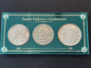 lot 43 image: South Dakota Centennial Set, 1889 Morgan, 1989 Silver Eagle