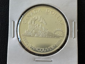 lot 129 image: 1986 Canada Silver Dollar Vancouver
