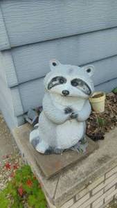 lot 360 image: Concrete Raccoon Figure