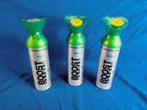 lot 64 image: Boost Oxygen is a portable, canned 95% pure oxygen supplement for non-medical use.