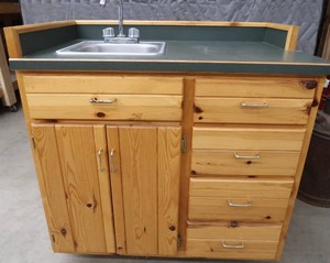 lot 62 image: WOOD VANITY WITH SINK  FAUCET