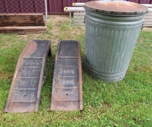 lot 76 image: METAL CAR RAMPS  METAL TRASH CAN