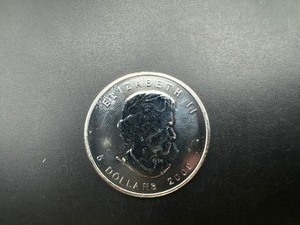 lot 61 image: 2009 BU Canadian 1 Oz. .9999 Silver Maple Leaf Coin