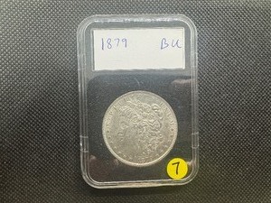 lot 7 image: 1879 Morgan Silver Dollar Marked BU When Purchased