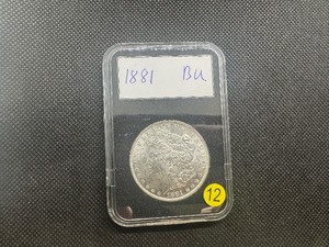 lot 12 image: 1881 Morgan Silver Dollar Marked BU When Purchased