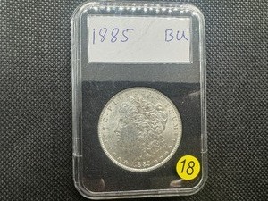 lot 18 image: 1885 Morgan Silver Dollar Marked BU When Purchased
