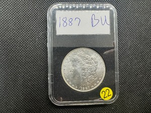 lot 22 image: 1887 Morgan Silver Dollar Marked BU When Purchased