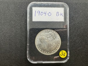 lot 34 image: 1904-O Morgan Silver Dollar Marked BU When Purchased