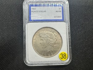 lot 38 image: 1922 Peace Silver Dollar IGS AU55