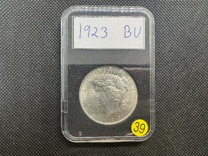 lot 39 image: 1923 Peace Silver Dollar Marked BU When Purchased