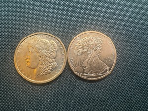 lot 99 image: 2 One oz Copper rounds Morgan and Liberty Design