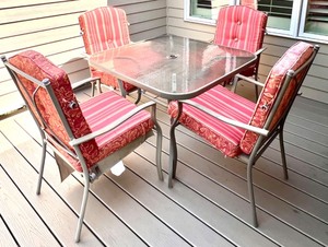lot 52 image: Outdoor Patio Set with Glass Table and 4 Reversible Cushioned Chairs