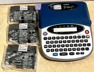 lot 131 image: Brother P-Touch Label Maker with 4 Clear Laminated Tapes