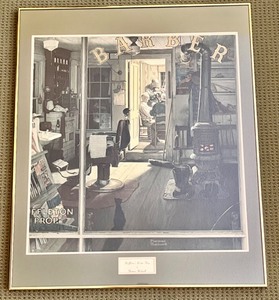 lot 149 image: Framed Print of Shuffletons Barber Shop by Norman Rockwell