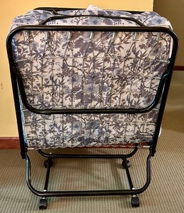 lot 112 image: Foldable Guest Bed with Floral Mattress