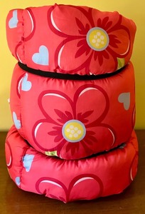 lot 125 image: Floral Padded Sleeping Bag and Childrens Book Set