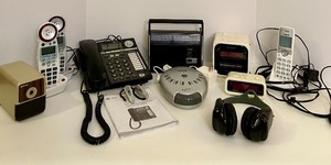 lot 273 image: Mixed Lot of Electronics Including Phones, Radios, and Clock