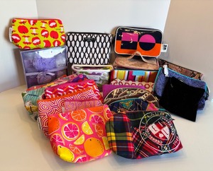 lot 228 image: Collection of 20 Designer Makeup Bags,Pouches & Toiletry Kit