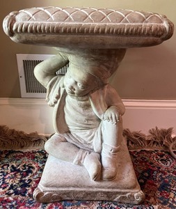 lot 10 image: Cement Side Table with Carved Child Motif