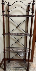 lot 28 image: Antique Four-Tier Metal Bakers Rack with Decorative Design
